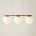 Halo Trio — Three-Globe Pendant in Opal Glass and Satin Brass