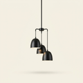 Comptoir — Trio of Matte Black Dome Pendants
